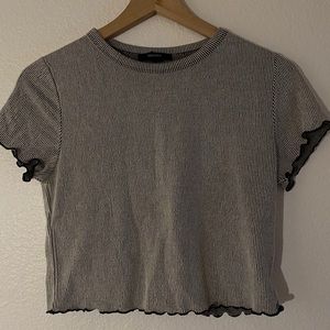 soft gray and black ribbed lettuce trim top